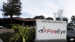 FILE - This Feb. 11, 2015, photo shows FireEye offices in Milpitas, Calif. 