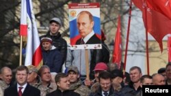 Atmosfera tokom obeležavanja petogodišnjice ruske aneksije na ulicama grada Simferopolja (Foto: Reuters/Alexey Pavlishak)