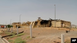 This photo released July 2, 2020, by the Atomic Energy Organization of Iran, shows a building after it was damaged by a fire, at the Natanz uranium enrichment facility some 322 kilometers south of Tehran, Iran. 
