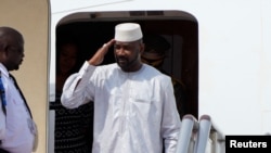 FILE - Interim President of the Republic of Mali, Assimi Goita, arrives at Beijing Capital International Airport ahead of the 2024 Summit of the Forum on China-Africa Cooperation in Beijing, China, Sep. 1, 2024. 