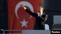 FILE - Ozgur Ozel, leader of Turkey's main opposition Republican People's Party (CHP), speaks during a rally to protest against the arrest of Esenyurt Mayor Ahmet Ozer, in Istanbul, Oct. 31, 2024. 