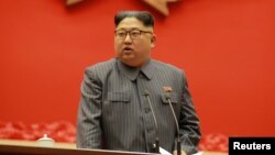 North Korean leader Kim Jong Un makes closing remarks at 5th Conference of Cell Chairpersons of the Workers' Party of Korea (WPK), Dec. 23 in this photo released by North Korea's Korean Central News Agency (KCNA) in Pyongyang, North Korea, Dec. 24, 2017.