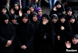 Women mourn during the funeral of top Hezbollah commander Mustafa Badreddine, who was killed in an attack in Syria, in Beirut&#39;s southern suburbs, Lebanon, May 13, 2016.