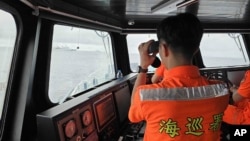 资料照：台湾海巡署发布的照片显示，中国海军舰只在台湾北部的彭佳屿附近航行。（2024年5月23日）