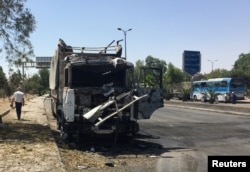 A general view shows the damage at one of the blast sites in Damascus, Syria, July 2, 2017.
