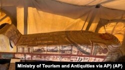 This Sept. 2020 photo provided by the Ministry of Tourism and Antiquities shows one of more than two dozen ancient coffins unearthed near the famed Step Pyramid of Djoser in Saqqara, south of Cairo, Egypt. (Ministry of Tourism and Antiquities via AP)