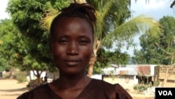 Fatmata Alieu stands outside her residence at the West Africa Fistula Foundation in Bo, Sierra Leone, May 10, 2016. (N. deVries/VOA)