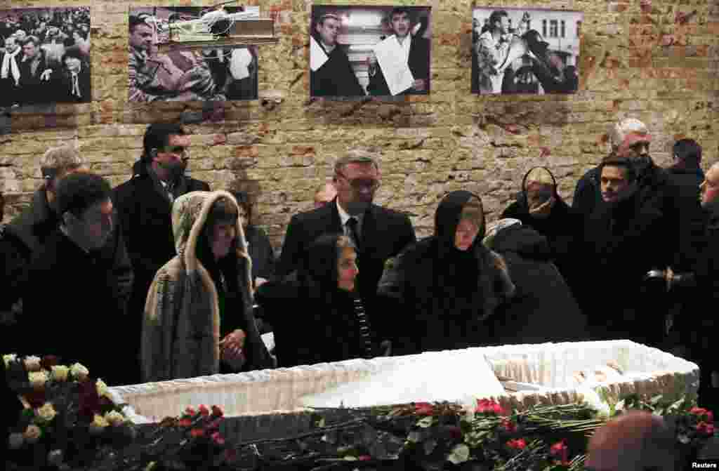 Mourners, including Dina Eidman (front row, third from left), mother of Russian leading opposition figure Boris Nemtsov, and Mikhail Kasyanov (center, rear), an opposition leader and former Russian prime minister, attend a memorial service before the fune