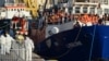 The "MV Lifeline", a vessel for the German charity Mission Lifeline, arrives with 234 migrants onboard in the harbor of Valletta, Malta, June 27, 2018.