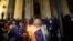 People gather to protest near the Parliament building in Tbilisi, Georgia, to oppose the government's decision to delay European Union accession negotiations until 2028.