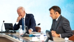 FILE - U.S. President Joe Biden and French President Emmanuel Macron take part in the final session of the G-7 summit in Carbis Bay, Cornwall in Britain, June 13, 2021.