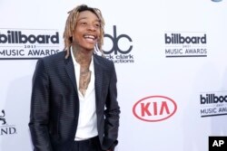 Wiz Khalifa arrives at the Billboard Music Awards at the MGM Grand Garden Arena, May 17, 2015, in Las Vegas.