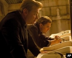 Director CHRISTOPHER NOLAN with LEONARDO DiCAPRIO on the set of Warner Bros. Pictures’ and Legendary Pictures’ sci-fi action film “INCEPTION,” a Warner Bros. Pictures release.
