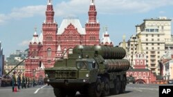 FILE - Russian S-400 air defense missile systems are seen during the Victory Day military parade marking 71 years after the victory in WWII in Red Square in Moscow, Russia, May 9, 2016. 