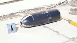 A weapon shell is pictured outside of Iraqi Prime Minister Mustafa al-Kadhimi's residence following an assassination attempt by an armed drone in Baghdad, Iraq in this screen grab taken from a handout video, Nov. 7, 2021.