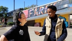 Jolene Johnson, left, says Minnesota state Sen. Omar Fateh has been attentive to residents of Little Earth, an affordable-housing community primarily for Native Americans, in Minneapolis. (Betty Ayoub/VOA)