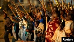 Miners on strike chant slogans as they march in Nkaneng township outside the Lonmin mine in Rustenburg May 14, 2014. 