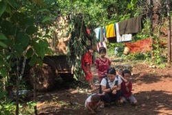 People take refuge in a jungle area in Demoso, Kayah state, June 3, 2021