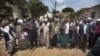 Kenyan Mau Mau War veterans and their supporters celebrate the announcement of a legal decision in Britain's High Court concerning Mau Mau veterans in Nairobi, Kenya, October 5, 2012.