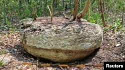 FILE - Part of an altar that researchers from Mexico's National Institute of Anthropology and History (INAH) discovered inside the Balamku ecological reserve in Campeche state, Mexico. (Mexico's National Institute of Anthropology and History/Handout via REUTERS)