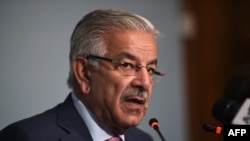 FILE - Pakistani Foreign Minister Khawaja Asif briefs the media at the end of a three-day conference in Islamabad, Pakistan, Sep. 7, 2017.