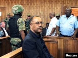 Mozambique's former finance minister Manuel Chang appears in court during an extradition hearing in Johannesburg, South Africa, Jan. 8, 2019.