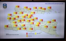 Peta sebaran virus corona di Jawa Timur. (Foto: Petrus Riski/VOA)