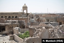 Families flee Old Mosul as soon as Iraqi forces are close enough to protect them, June 25, 2017.