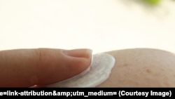 Applying sunscreen to prevent skin cancer is recommended by doctors