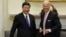 FILE - Joe Biden and China's Xi Jinping are pictured in the Roosevelt Room at the White House in Washington, Feb. 14, 2012, when each was his nation's vice president.