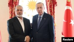 Turkish President Erdogan meets with Ismail Haniyeh, leader of the Palestinian Islamist group Hamas, in Istanbul