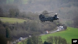 FILE - A Chinook near Salisbury Plain in Wiltshire, Britain, where Australian Armed Forces were supporting the U.K.-led training of Ukrainian recruits on Feb. 1, 2023.