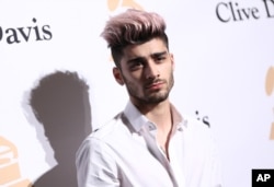 Zayn Malik arrives at the 2016 Clive Davis Pre-Grammy Gala at the Beverly Hilton Hotel on Feb. 14, 2016, in Beverly Hills, Calif.