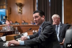 FILE - Scott Gottlieb, commissioner of the Food and Drug Administration, answers a question from a Senate committee at the Capitol in Washington, Oct. 5, 2017.