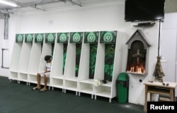 Leandro Bastos of Chapecoense's under-15 soccer team sits inside the team's locker room at the Arena Conda stadium in Chapeco, Brazil, Nov. 29, 2016.
