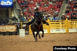 Photo of Sammy Jo Bird, member of Montana Blackfeet Nation, competing in 2016 Indian National Finals Rodeo in November 2016. Courtesy: Smith Rodeo Photos.