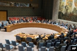 FILE - The United Nations Security Council votes on a new sanctions resolution that would increase economic pressure on North Korea to return to negotiations on its missile program at U.N. headquarters, Aug. 5, 2017.