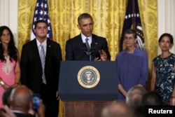 FILE - U.S. President Barack Obama delivers remarks on the Clean Power Plan at the White House in Washington, Aug. 3, 2015.