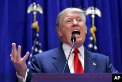 FILE - Developer Donald Trump delivers remarks during his announcement that he will be a Republican candidate for president, in New York, June 16, 2015.