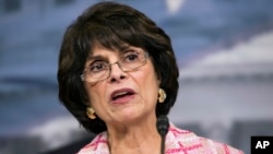FILE - Rep. Lucille Roybal-Allard, D-Calif., speaks during a news conference opposed to immigration raids targeting Central American families with children, in Washington, Jan. 12, 2016.