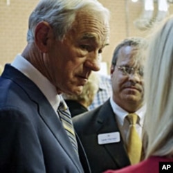 Texas Congressman Ron Paul greets supporters before he speaks at the Iowa Faith & Freedom Coalition's Presidential Forum at the Iowa State Fairgrounds in Des Moines, October 22, 2011