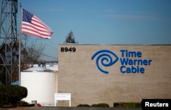 FILE - A Time Warner Cable office is pictured in San Diego, California.