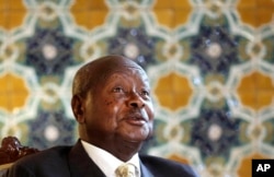 FILE - Ugandan President Yoweri Museveni speaks to reporters at the Akasaka Palace state guesthouse in Tokyo, Sept. 12, 2015.