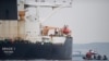 Britain Calls Ship Seizure 'Hostile Act' As Iran Releases Video of Capture 