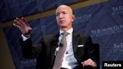 FILE - Jeff Bezos, president and CEO of Amazon, speaks at an event in Washington, Sept. 13, 2018.