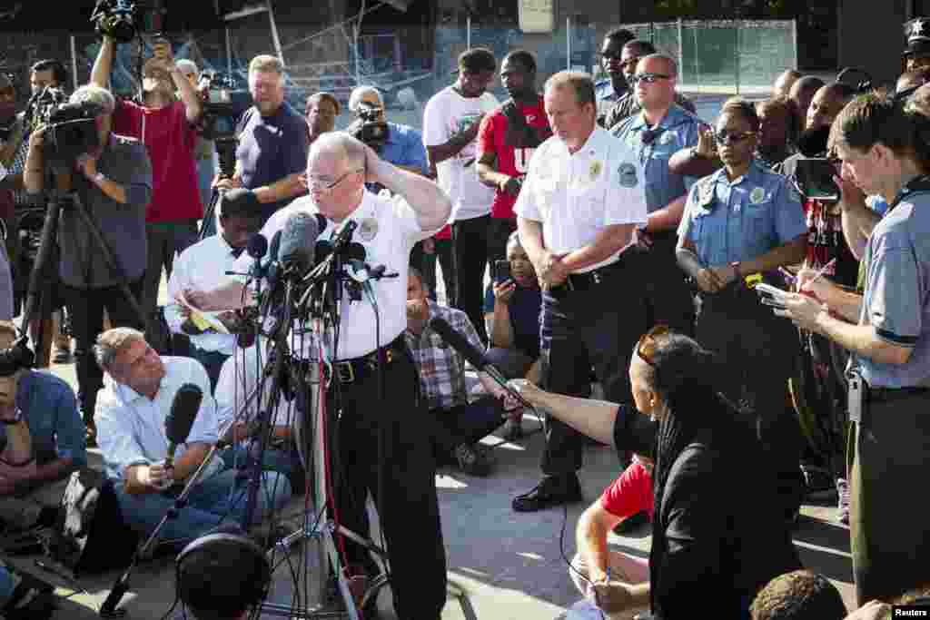 Ferguson Police Chief Thomas Jackson announces the name of Darren Wilson as the officer involved in the shooting of Michael Brown, in Ferguson, Missouri, Aug. 15, 2014.