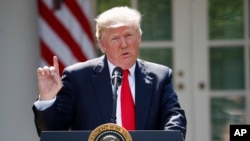 Presiden AS Donald Trump saat mengumumkan keputusan AS untuk mundur dari Kesepakatan Paris, 1 Juni 2017 di Gedung Putih, Washington. (AP Photo/Pablo Martinez Monsivais).