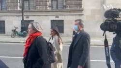 香港駐倫敦經貿辦間諜案再度開庭，被告袁松彪離開法庭時並無理會記者提問