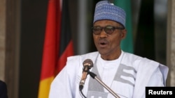 FILE- Nigerian President Muhammadu Buhari speaks during German President Joachim Gauck's visit to the State House in Abuja, Nigeria Feb. 11, 2016. 