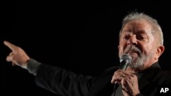Brazil's former President Luiz Inacio Lula da Silva addresses supporters gathering to protest his conviction in Sao Paulo, Brazil, July 20, 2017. A judge ordered the seizure of more than $2.8 million in pension funds from Silva.